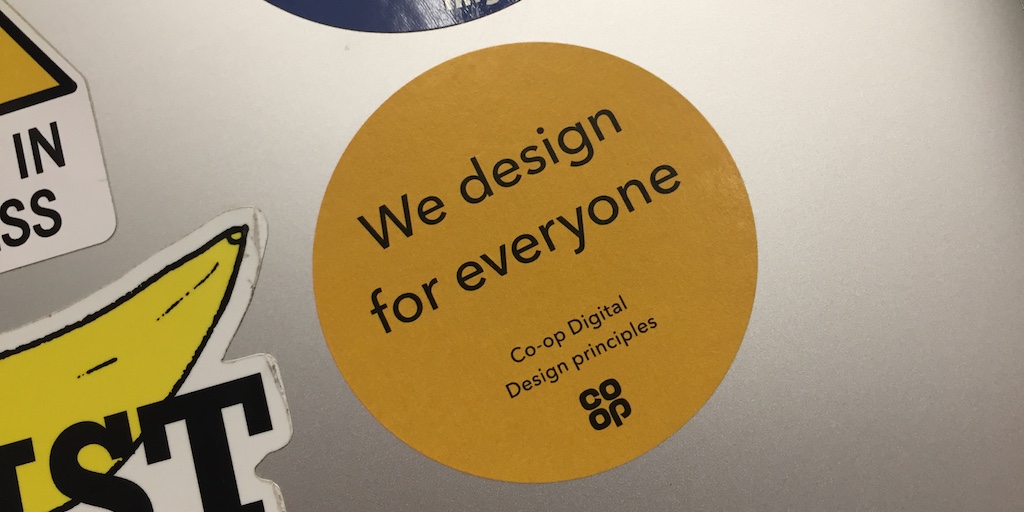 sticker that reads: we design for everyone
