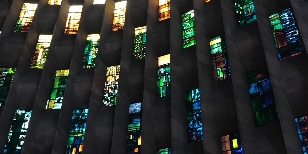 Colourful stained glass windows at Coventry cathedral.