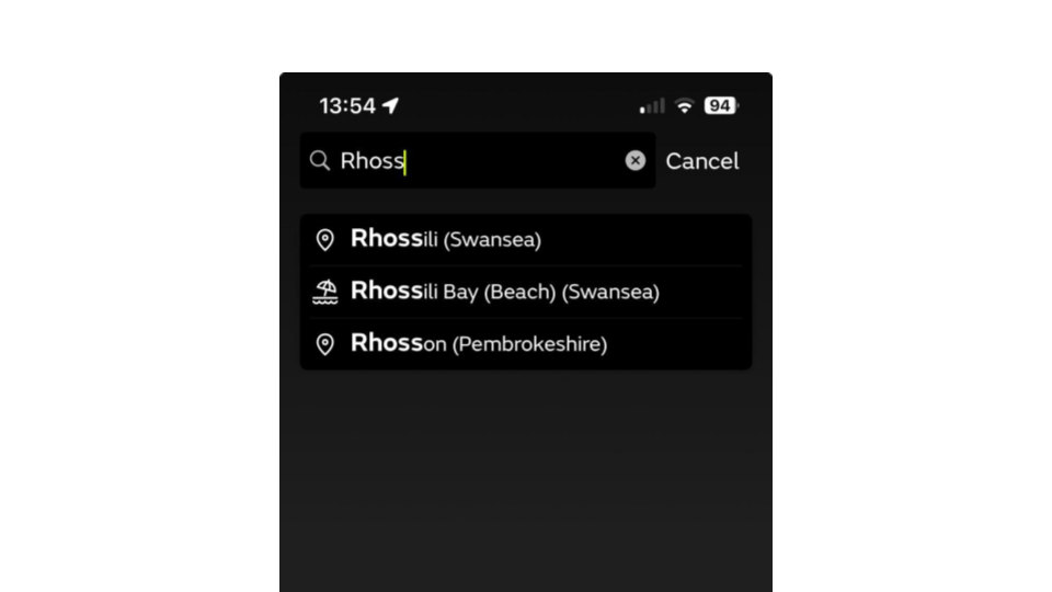 A screenshot of the Met Office app that shows search results for a place. Normal places have a map pin icon. Beach places have a parasol icon.